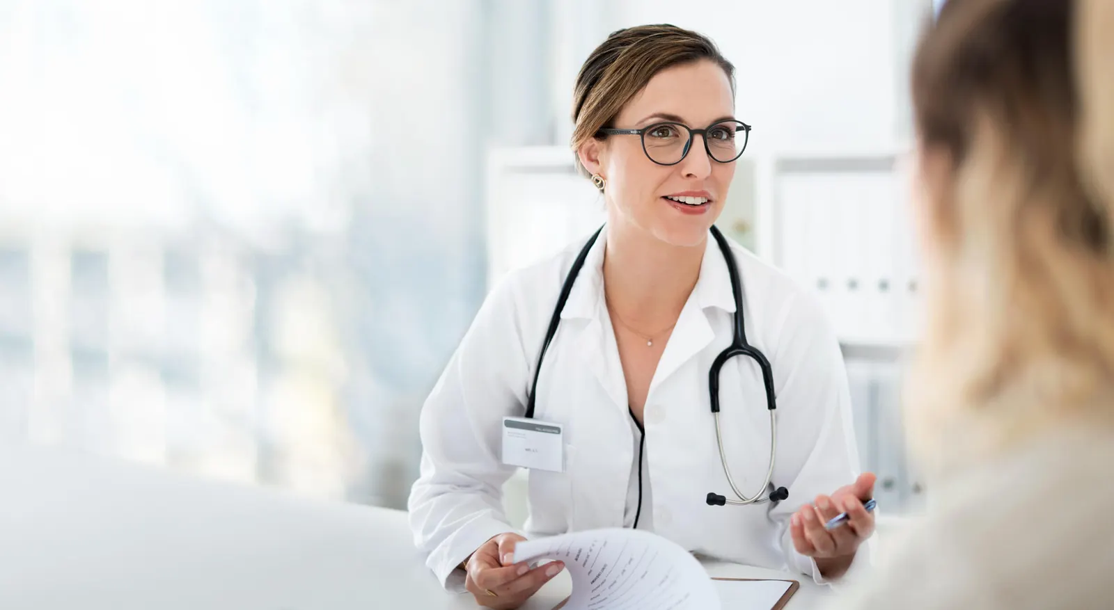 Physician consulting with a patient