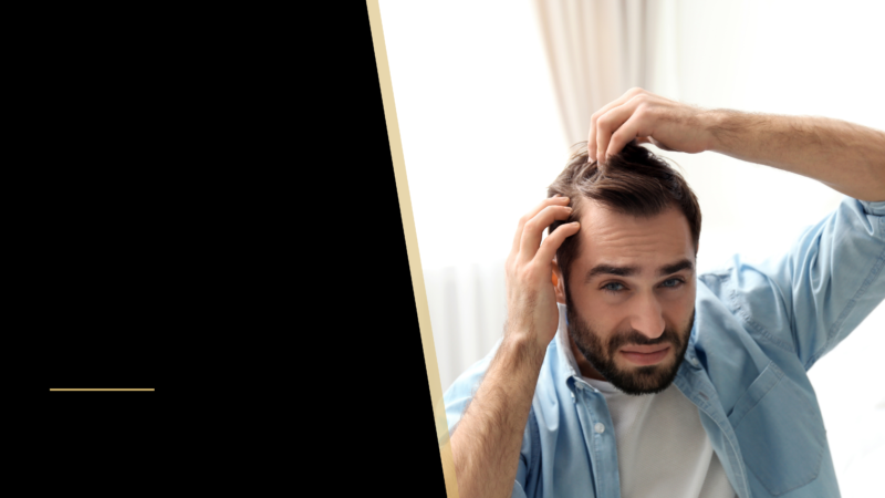 Recognizing the First Signs of Hair Thinning 22 man is looking at his hair