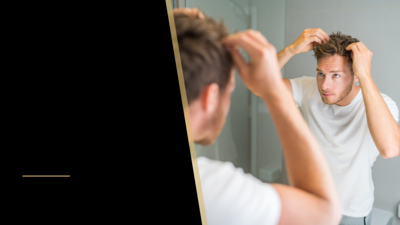 Don’t Believe These Balding Myths 4 man looking into the mirror