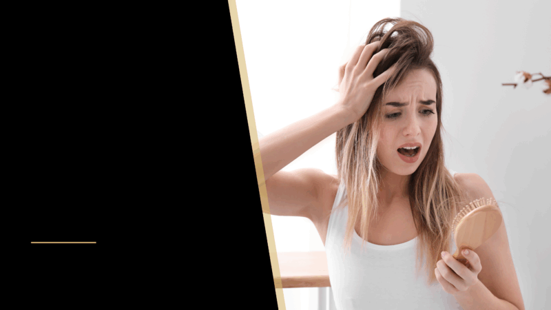 Hair Loss in Women: Exploring Female Pattern Baldness 20 A woman looking at his hair left on a hairbrush