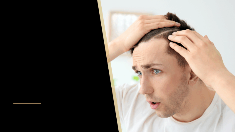 I'm balding at 23: Too young to have hair loss & be bald? 28 A man touching his hair